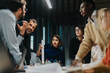 Multiracial business team brainstorming creative ideas in modern office