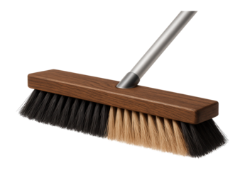 A rugged street broom with mixed bristles for both fine dust and heavy debris, suitable for a garden shed.