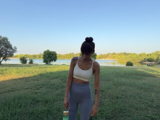 young woman walking in the park