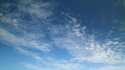 Time lapse. The Vibrant Sky, Adorned With Fluffy Clouds Floating Gracefully Overhead, Enchants All