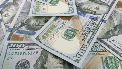 Modern U.S. Dollar stacks represent contemporary finance and reflect economic trends