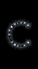 Fornasetti's Handmade-Inspired "C": Spiked String, Celestial Motifs & 1980s Film Effect