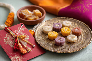 Rakhi or wristband in decorated thali with sweets