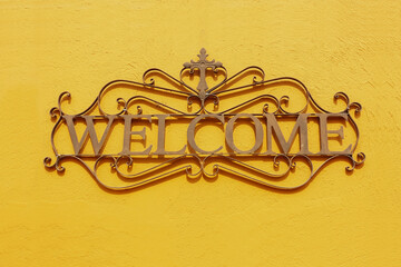 welcome vintage sign on a wall