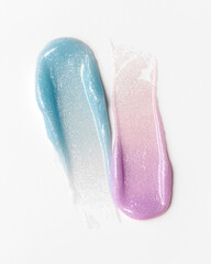 Glossy Blue and Pink Gel Smear with Sparkles on White Background â€“ Cosmetic Texture for Beauty Product Design
