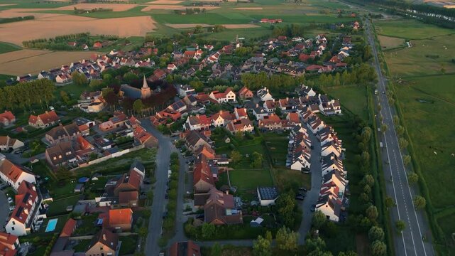 High Forward Flight Over Ramskapelle&rsquo;s White Homes at Sunset | FlyLens 4K