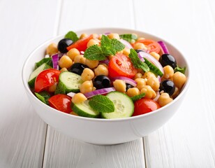 Colorful Mediterranean salad in a white bowl