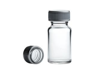 Empty glass bottle mockup with silver metal cap for pharmaceutical use isolated on black background