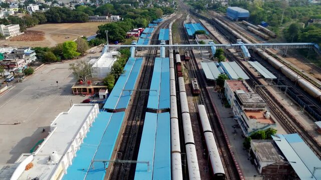 Aerial view of Villupuram railway junction filled with vibrant activity and iconic blue roofs