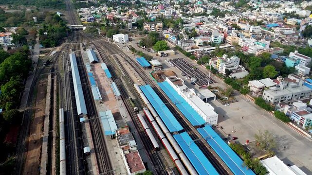 Aerial view of Villupuram railway junction filled with vibrant activity and iconic blue roofs