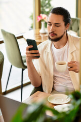 Remote freelancer enjoys coffee while working in a cozy cafe during summer