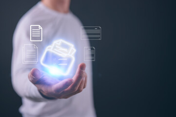 Businessman hand holding virtual document icon in concept of practices and policies , procedure...