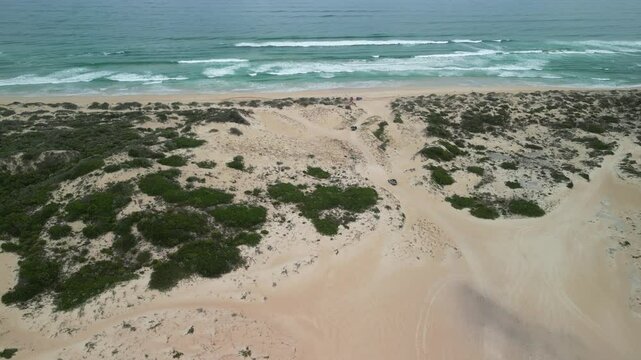Beachport dunes in South Australia with scattered vegetation and 4WD tracks crossing the terrain