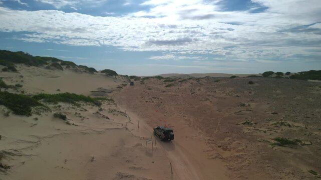 Beachport dunes in South Australia with scattered vegetation and 4WD tracks crossing the terrain