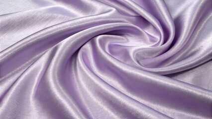 The soft lavender silk fabric is draped in elegant folds, creating a luxurious texture