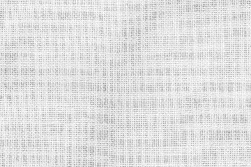 Fototapeta premium White hessian sackcloth woven with jute burlap cotton hemp fabric cloth textile texture pattern background in white light color
