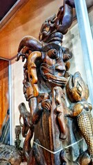 cultural heritage of carved sculptures and wood typical of the Toba Batak tribe with traditional...