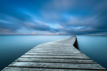 Wooden pier on a lake © Yannick Lefevre