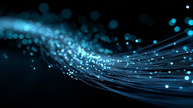 Abstract glowing blue fiber optic cables conveying high speed digital data transmission background art.