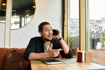 Freelancer engaged in remote conversations at a lively cafe during summer afternoons