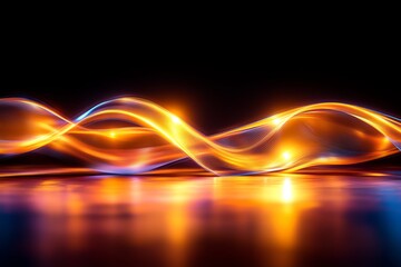 Vibrant orange and blue light waves create a dynamic glowing pattern against a dark background, evoking energy and motion.