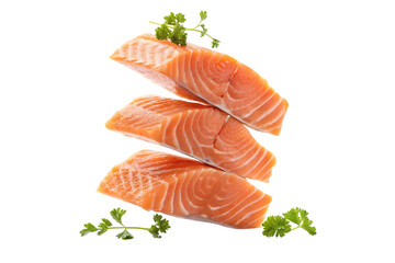 Fresh salmon fillets with parsley garnish on black fish seafood