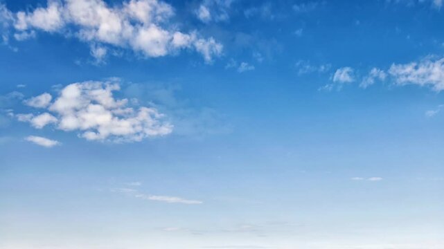 Realistic blue sky with gray cloud background.