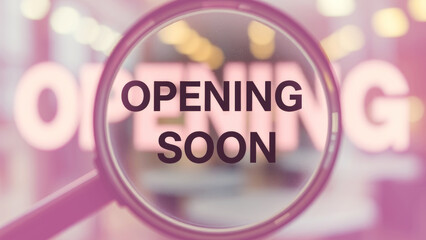 Magnifying glass reveals announcement of new business opening soon in a modern urban setting