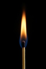 Isolated Matchstick Igniting in Darkness