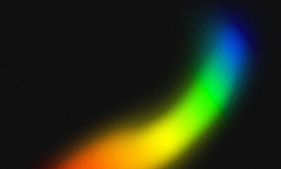 Arc luminous band transitioning from red to blue through green and yellow on a dark granular field