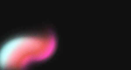 Soft glow pastel hues of cyan, pink, and white against a dark granular space