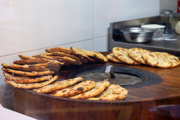 Close-up of a freshly baked Asian bread toast in a traditional oven.