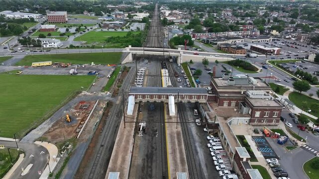 Historic Amtrak train station in Lancaster Pennsylvania. Aerial Birds Eye shot. Railroad and railway in American city.