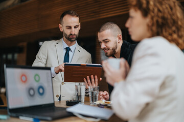 A group of business professionals working collaboratively in an outdoor setting, utilizing technology for effective communication.