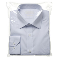 A neatly folded light blue dress shirt packaged in clear plastic isolated on transparent background