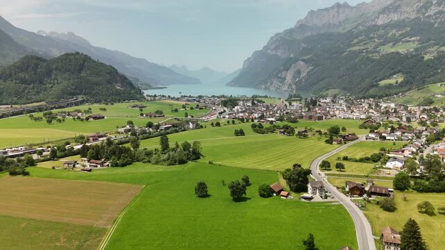Scenic Aerial View of Rural Countryside and Alpine Landscape Near Flums, Berschis and Walenstadt, Switzerland &ndash; Drone Footage
