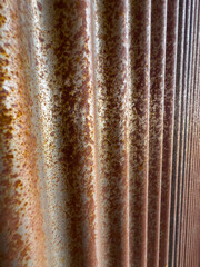 Close-Up of Rusted Corrugated Metal Wall Texture