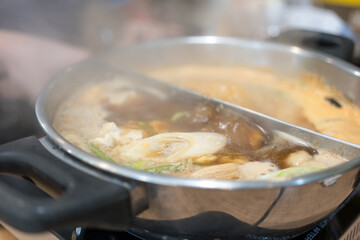 Hot soup Shabu Shabu and Sukiyaki with many vegetables before put beef or pork.