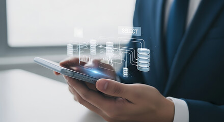 Businessperson using smartphone to access and manage digital data network.