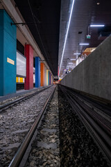 View of rails in a subway station.