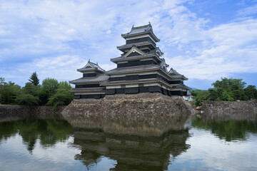 Matsumoto Castle or Crow Castle in Summer, is one of Japanese premier historic castles in easthern...
