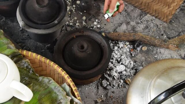 Closeup of a man's hands cooking Serabi Indonesian food