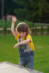little boy playing with toy airplane