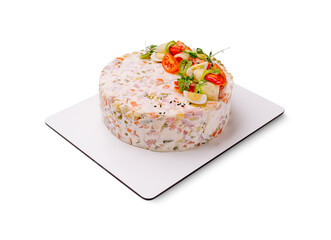 A creative reinterpretation of the classic Olivier salad, shaped like a celebratory cake