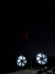 A futuristic scene featuring large fans and a red flag against a starry night sky, evoking themes of exploration and innovation.