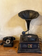 Old analog telephone and phonograph