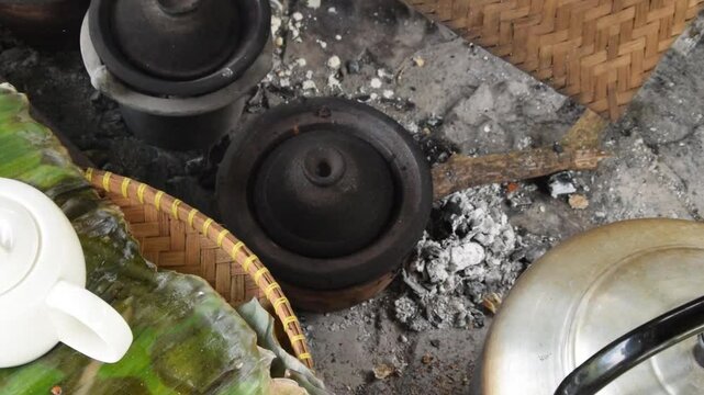 Closeup of a man's hands cooking Serabi Indonesian food