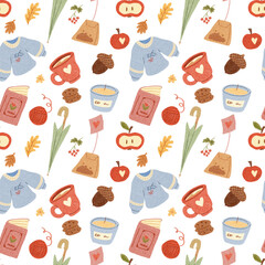 Autumn doodle seamless pattern with book, sweater, tea bag, umbrella, cup, leaves, candle, ball of woolen threads. Hand drawn illustration.