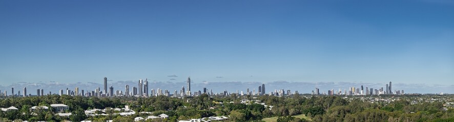 Fototapeta premium Gold Coast city skyline against blue sky, pano panorama banner, Queensland, Australia