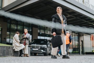 Confident woman outdoors with a briefcase, surrounded by urban activity and people.